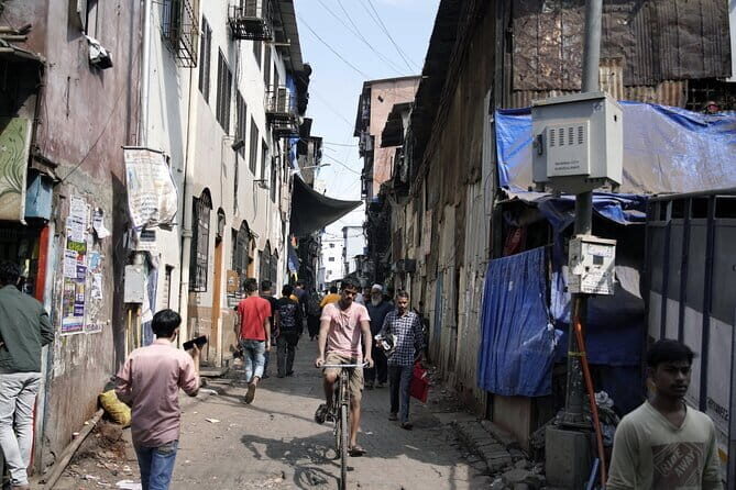 Mumbai Dharavi Slum, Dhobi Ghat & Dabbawala Lunchbox Tour - Dharavi Lanes and Workshops: Where Resilience Looks Like Work