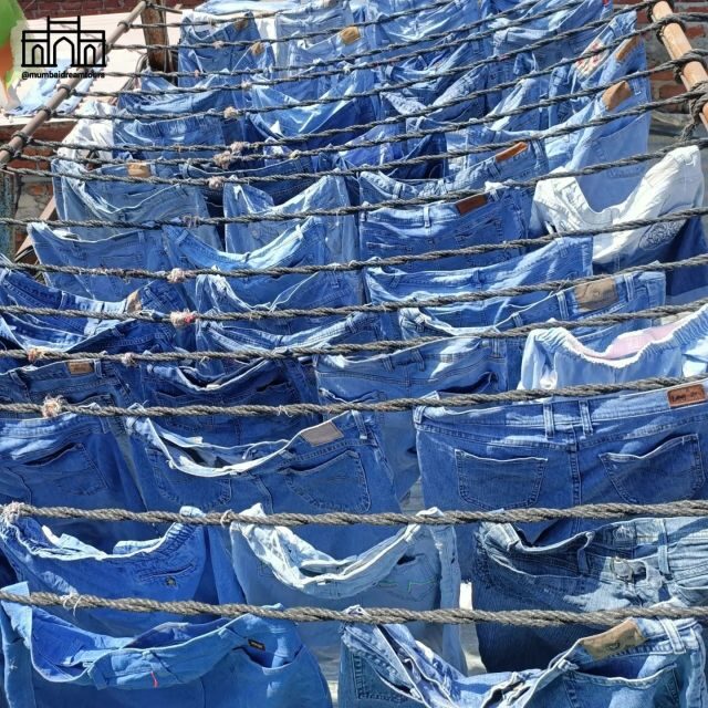 Mumbai: Dhobi Ghat Tour with Dharavi and Train Ride Options - Mahalaxmi Dhobi Ghat: an open-air laundry you can actually understand