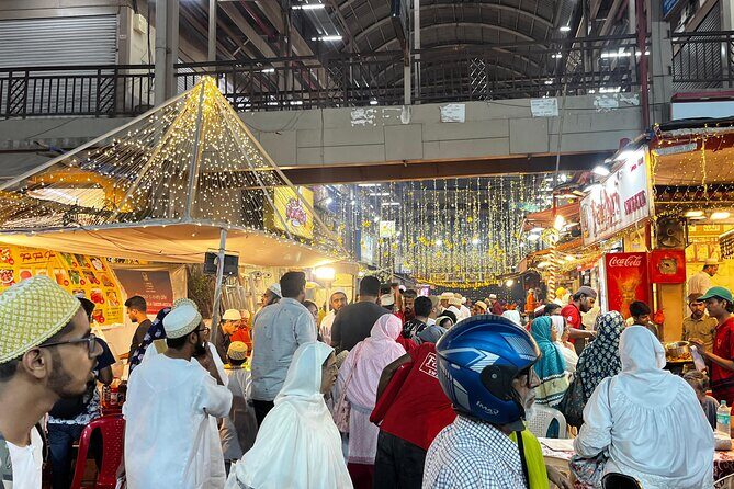 Mumbai Street Food & Bazaar Tour with Local Transport - Mohammed Ali Road: street food energy and a sweet finale at Taj